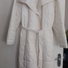 Capsule White Quilted Longline Coat.