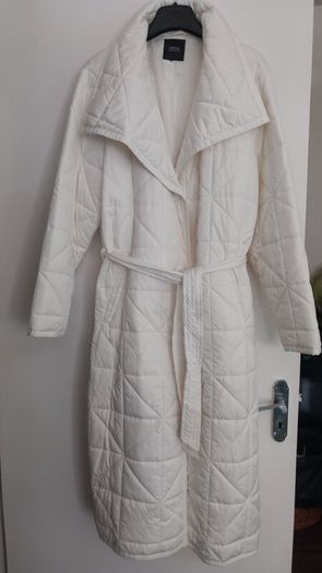 Capsule White Quilted Longline Coat.