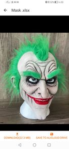 The Joker Batman Halloween latex mask with hair.
