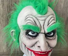 The Joker Batman Halloween latex mask with hair.