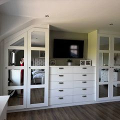 White mirror fitted wardrobes with 10 drawer chest