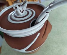 A large Stephen Pearce pottery soup pot with bird cover and ladle...