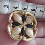 Vintage gold tone dress clip. Image 3