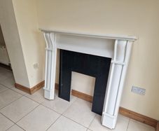 fireplace mantel and surround