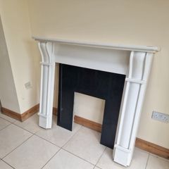 fireplace mantel and surround