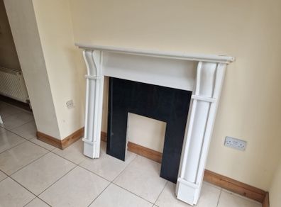 fireplace mantel and surround