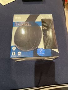 New bluetooth compatible travel headphones in box