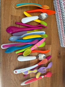 Baby weaning spoons, freezer trays, bibs, cup