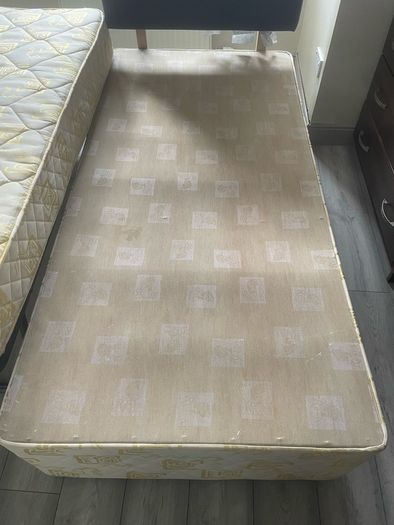 Single bed frame with guest mattress and headboard