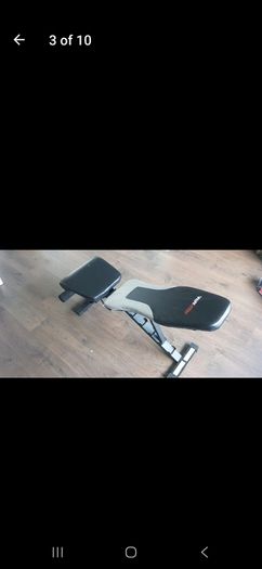 BODY IMAGE Power cage/Squat rack with Olympic bar bumper plates and adjustable bench