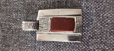 Large  silver pendant with goldstone