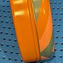 Colourful circular tin box Image 3