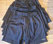 5 pairs of black Kipsta black shorts 10-11
