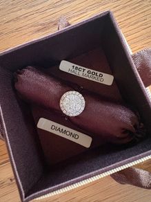 Diamond cluster engagement ring