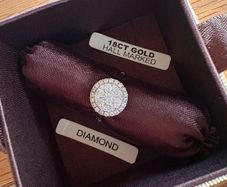Diamond cluster engagement ring