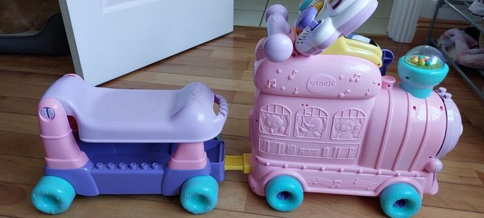 V-Tech pink walker/ride on train