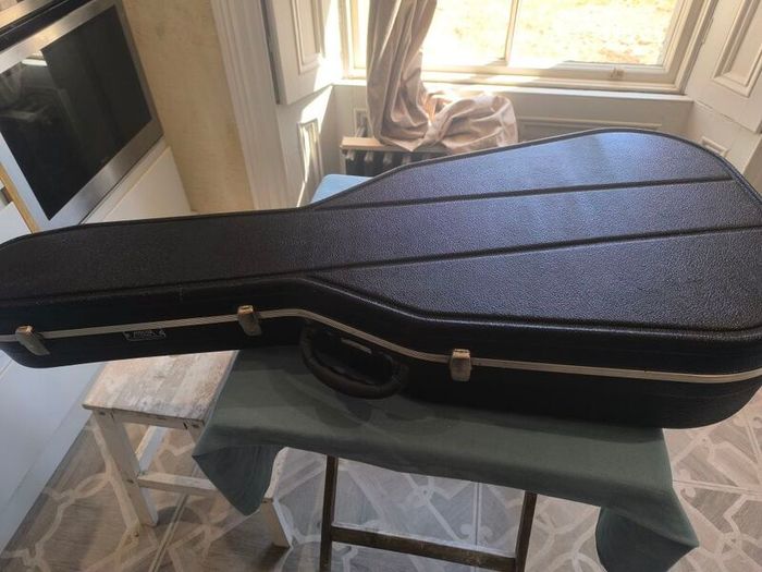 Acoustic guitar and Hiscox hard case