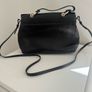 RED V Valentino genuine black leather crossbody bag with large bow and pink interior lining Image 7