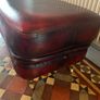 Leather Footstool on brass Castors. Image 4