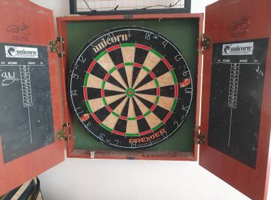 dart board in cabinet