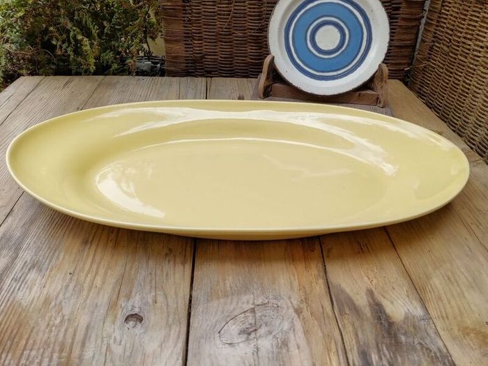 Yellow Swedish dish, yellow platter