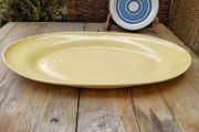 Yellow Swedish dish, yellow platter