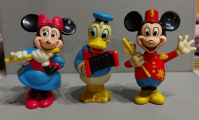 Trio of vintage disney figures