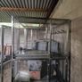 Warehouse shelving and stainless steel cage Image 5