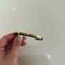 Calvin Klein black and gold bangle Image 3