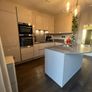 KUBE Modern High-Gloss Kitchen & AEG Appliances Image 4