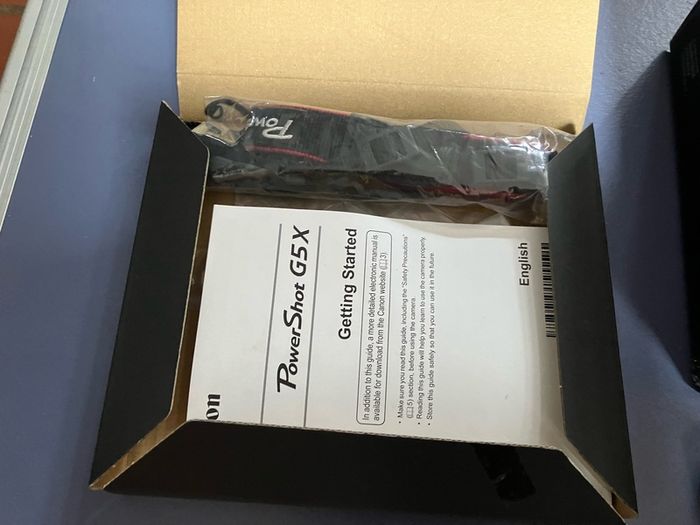 canon G5x complete in box as new. Only set up but never used . Spare camera