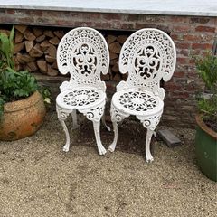 white garden chairs