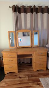 Wooden vanity unit with mirror and drawers