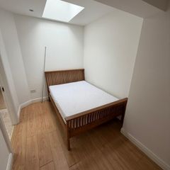 Wooden wardrobe and bed