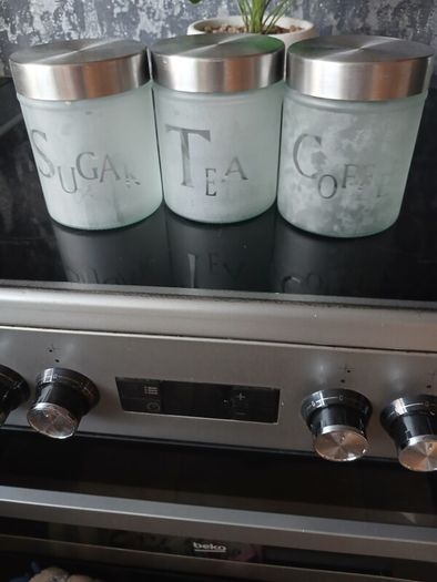 Bread bin and 3 Glass Canisters.