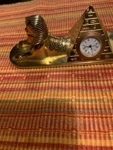Pyramid pen holder and clock