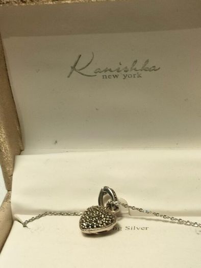 New and boxed Sterling Silver Swarovski Marcasite pendant set