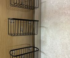 Glass-mounted shower caddies