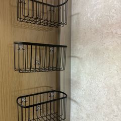 Glass-mounted shower caddies