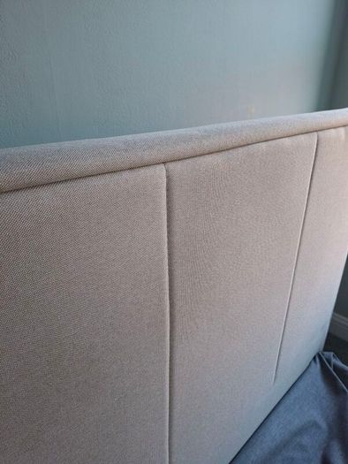 Standard double bed with cream headboard
