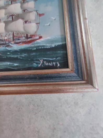 Framed oil of a sailing ship on board signed Y. Jones