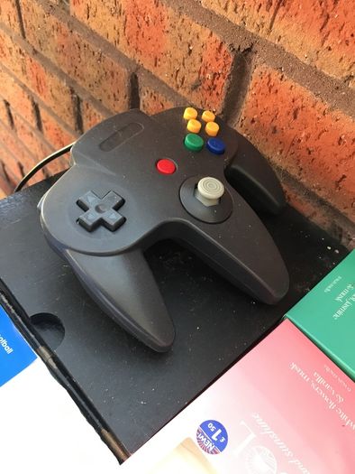 N64 with 2x Controllers along with Mario Kart/1080 Snowboarding