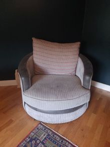 Grey swivel armchair