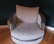 Grey swivel armchair