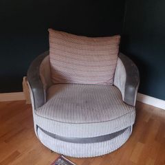 Grey swivel armchair