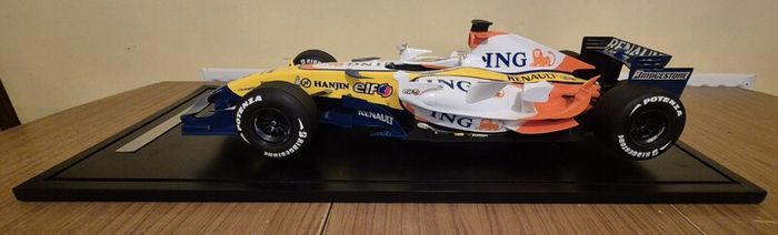 A 1:6 scale (32 inches long Formula 1 car) limited edition model of the 2007 Season ING Renault R27 F1 Team car
