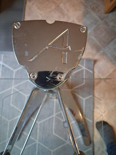 glass and chrome stand