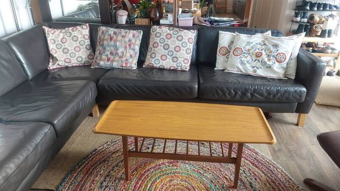 Unusual and Practical Mid-Century Modern Wooden Coffee Table with a Hard-Wearing Wood-Patterned Melamine Top and Slatted Magazine Shelf