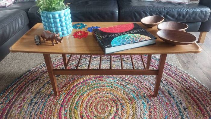 Unusual and Practical Mid-Century Modern Wooden Coffee Table with a Hard-Wearing Wood-Patterned Melamine Top and Slatted Magazine Shelf