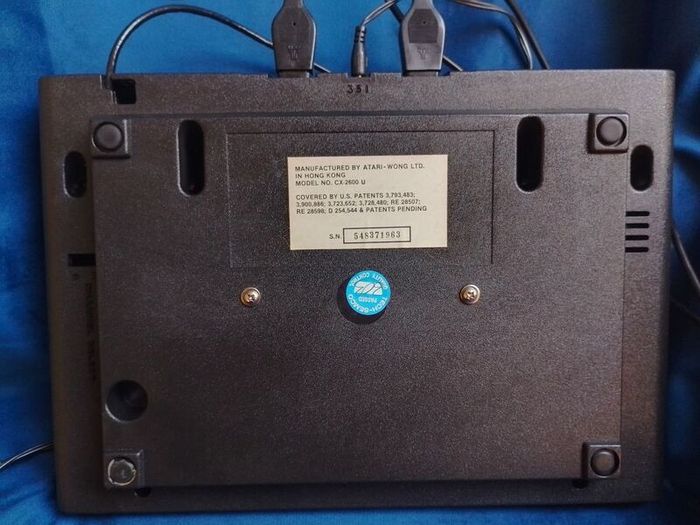 Atari 2600 'woody' console set with ganes